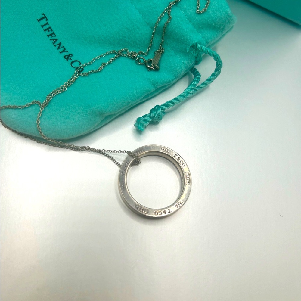 Tiffany & Co Sterling Silver
1837 Circle Pendant 16"
Necklace in Pouch Lovely